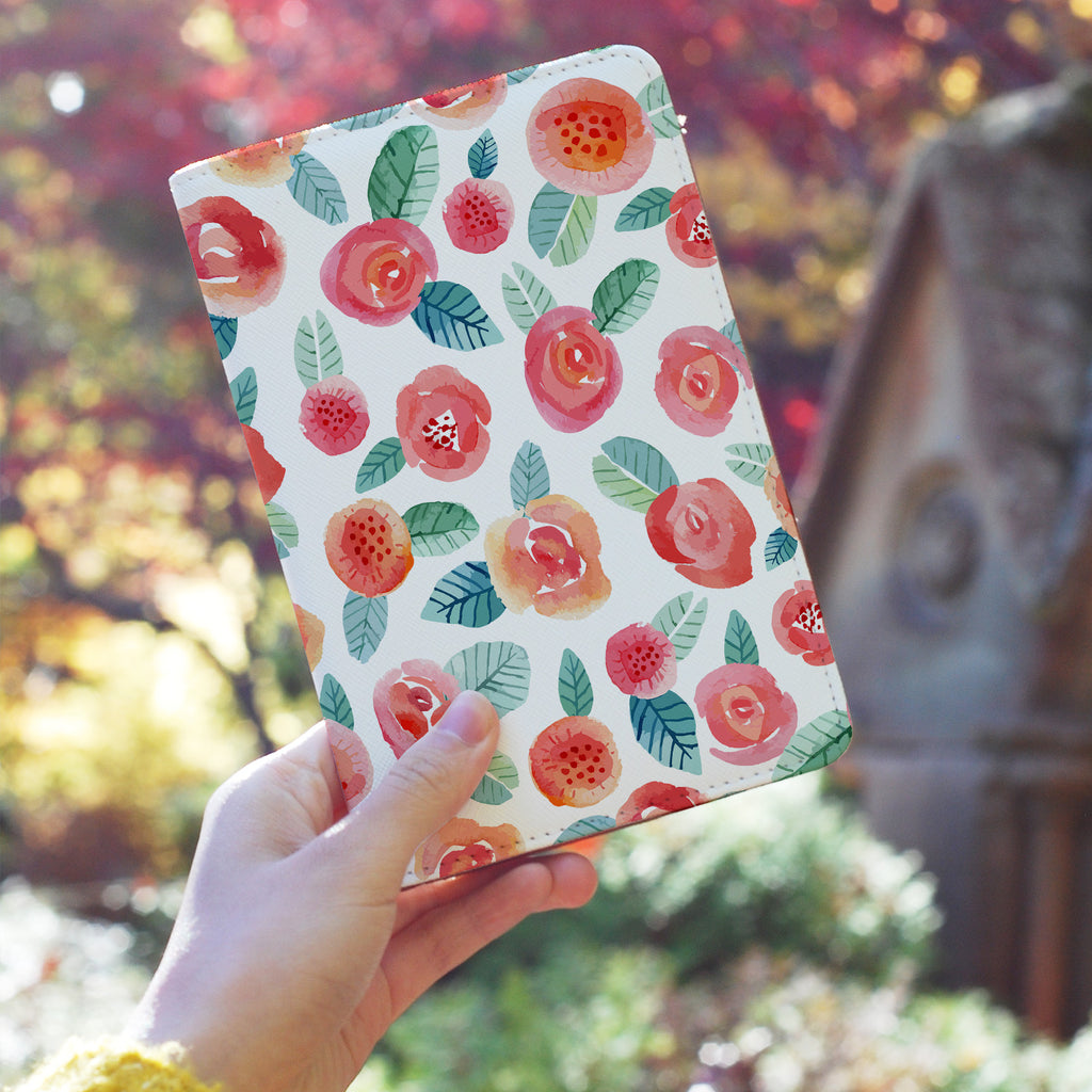 a girl holding personalized RFID blocking passport travel wallet with Rose design
