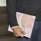 A business man holds Personalized VistaCase reMarkable Pen Holder Case with Artistic Flower design