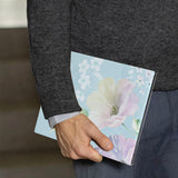 A business man holds Personalized VistaCase reMarkable Pen Holder Case with Paisley design